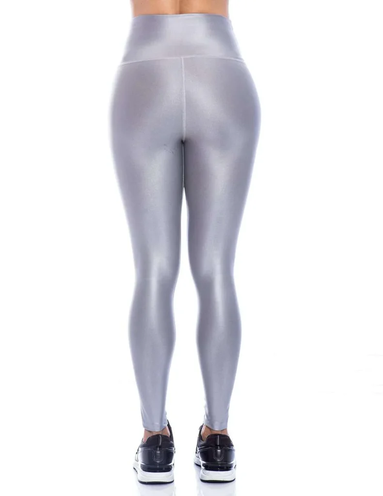 Metallic Silver Leggings for Women's Activewear Clothing in a Bright Studio